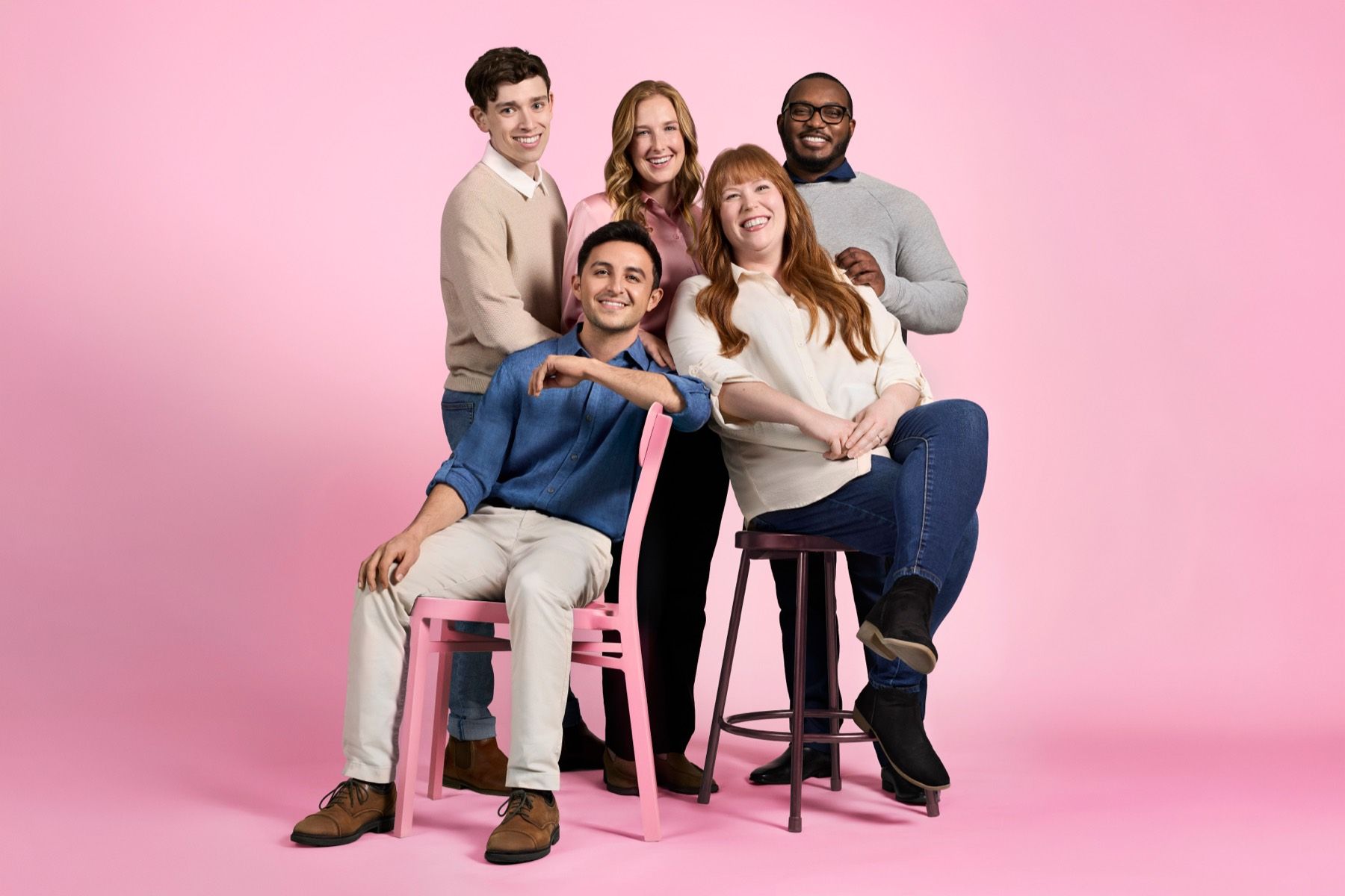 Five Patient Navigators gathered together, smiling